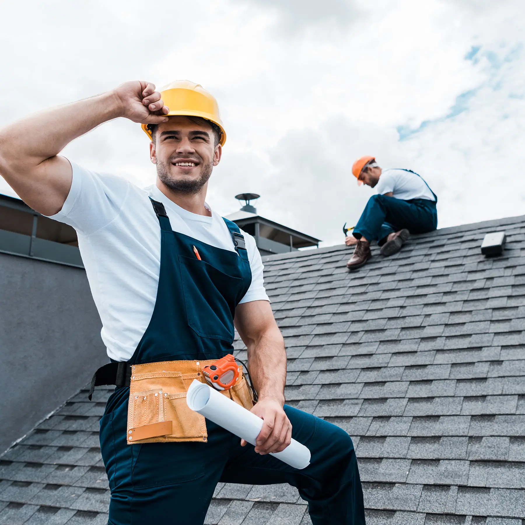 Worker on a roof.