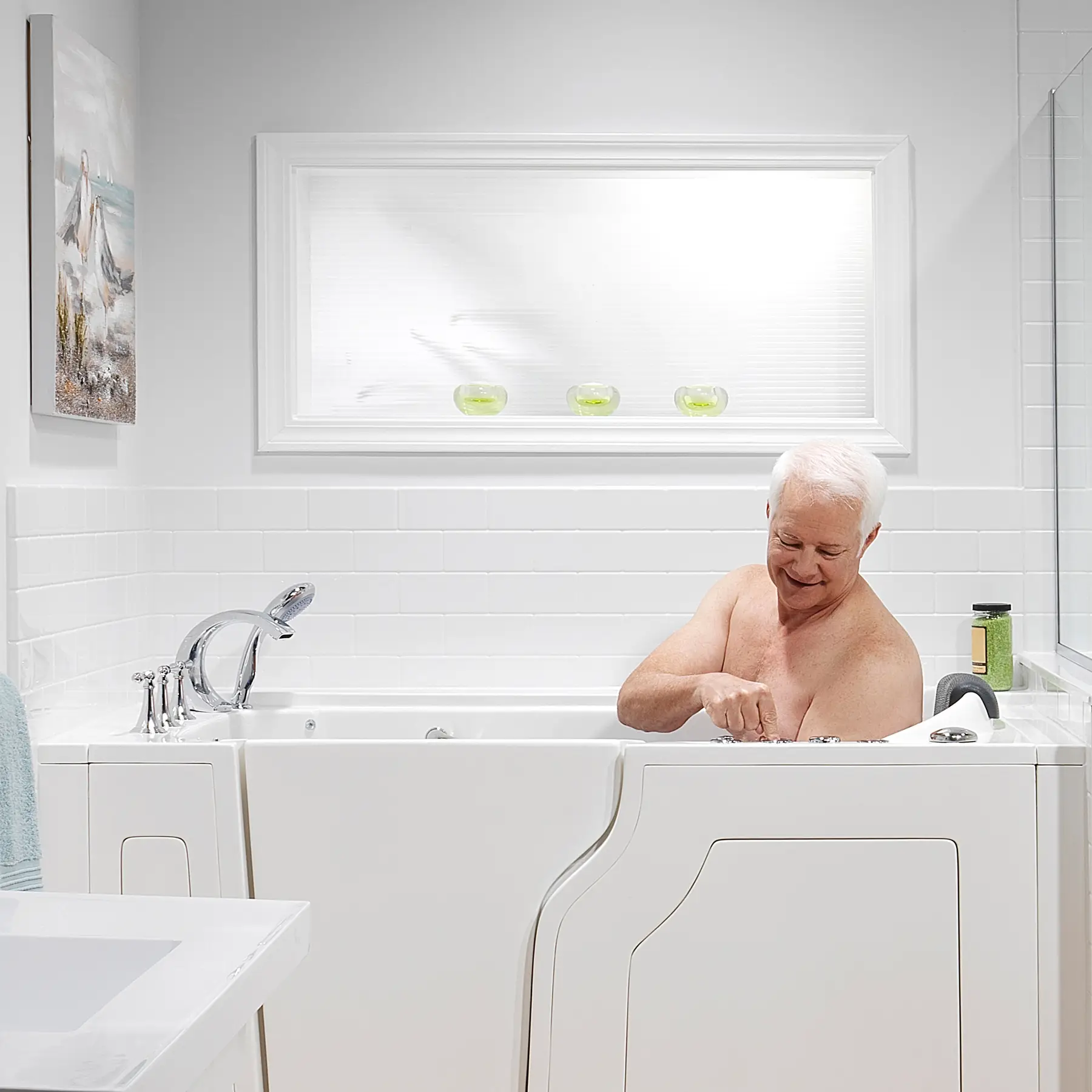 A man in a walk-in bath.