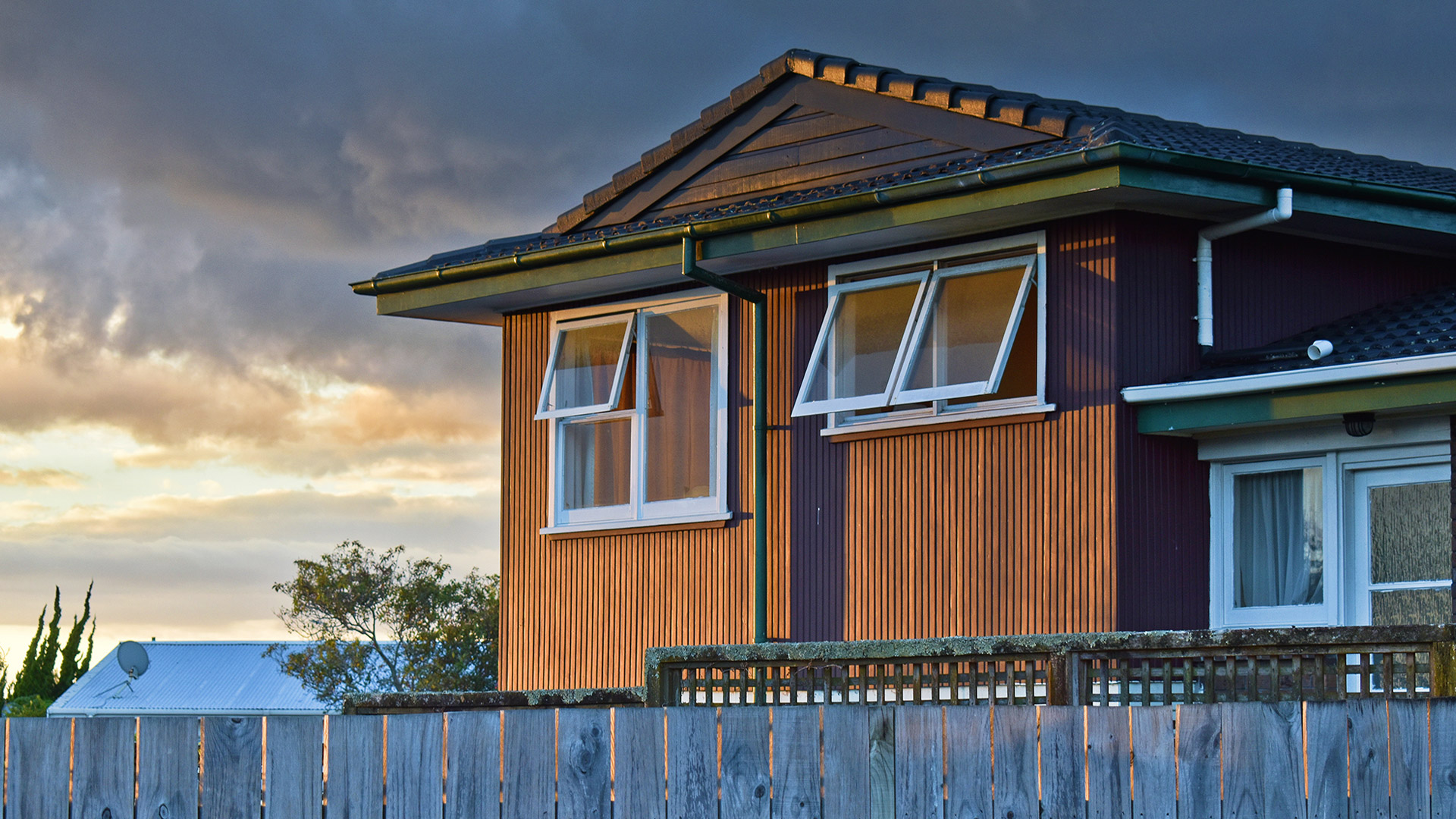 Exterior of a house with modern windows.