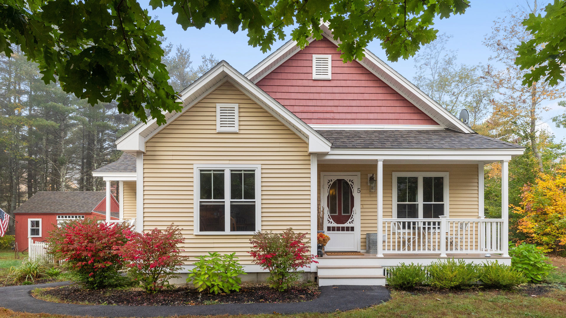 House with siding and matching roof.