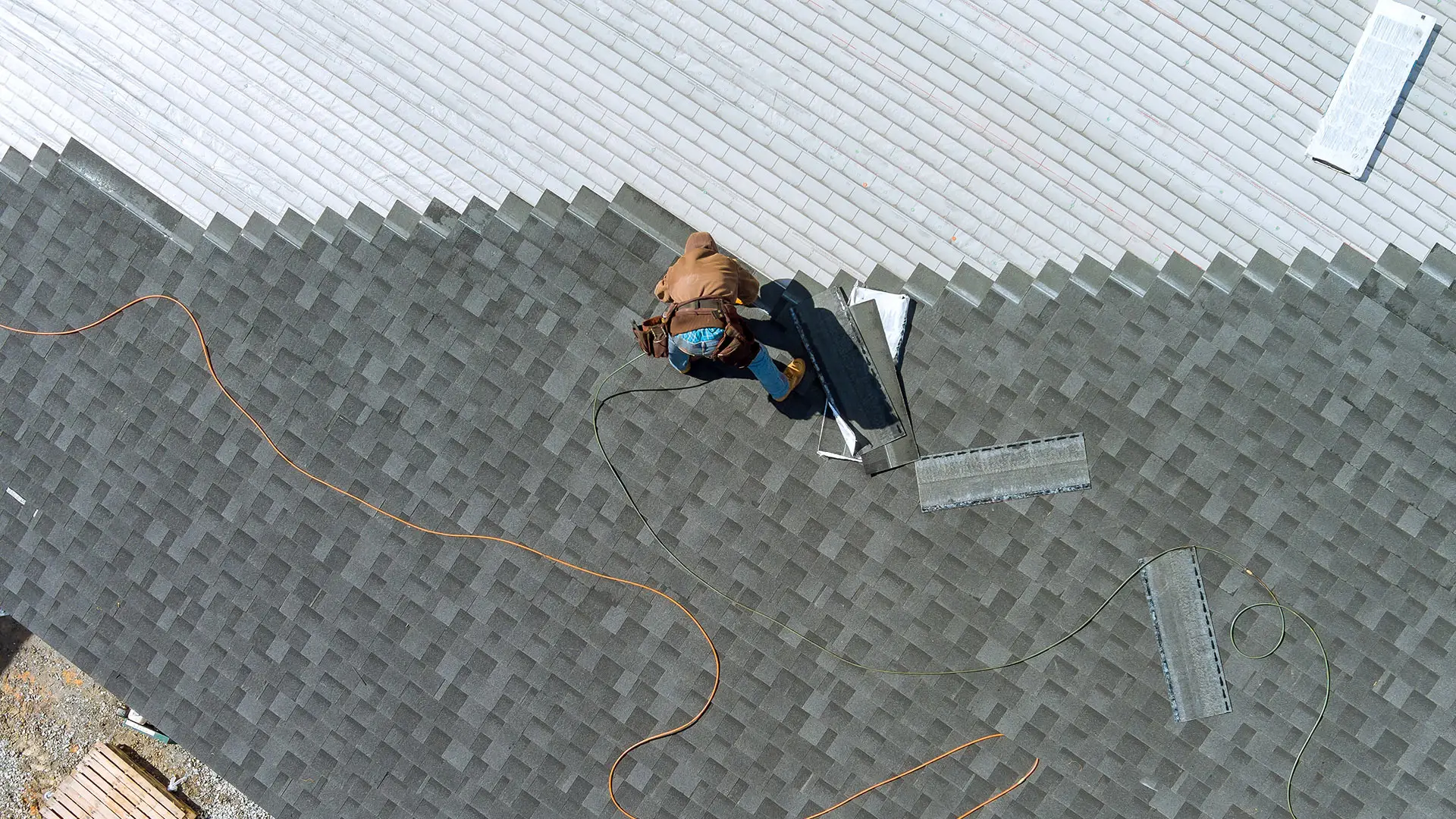process of new roof replacement with shingles