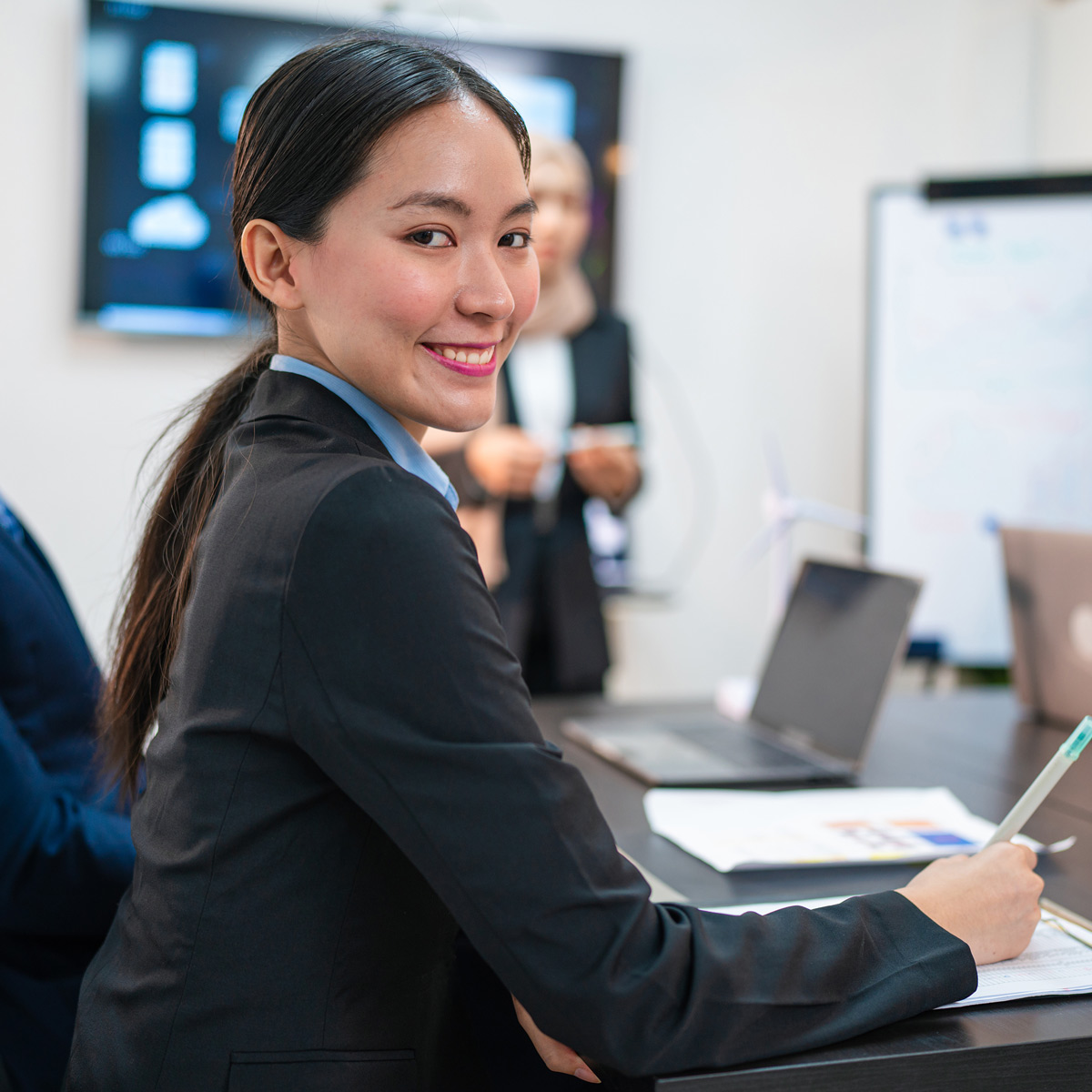 Business woman in office.