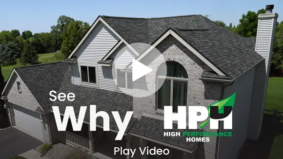 House with video play button. Play Video.